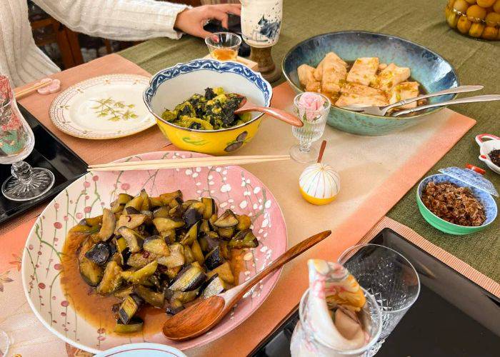 A table filled with vegetarian food at a vegetarian cooking class in Tokyo.